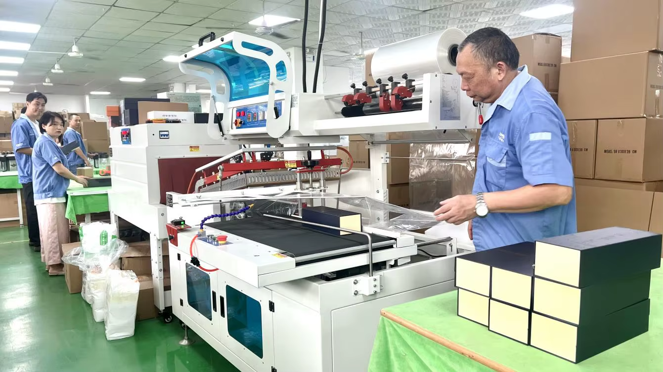 Product cleaning, accessory packing and boxing